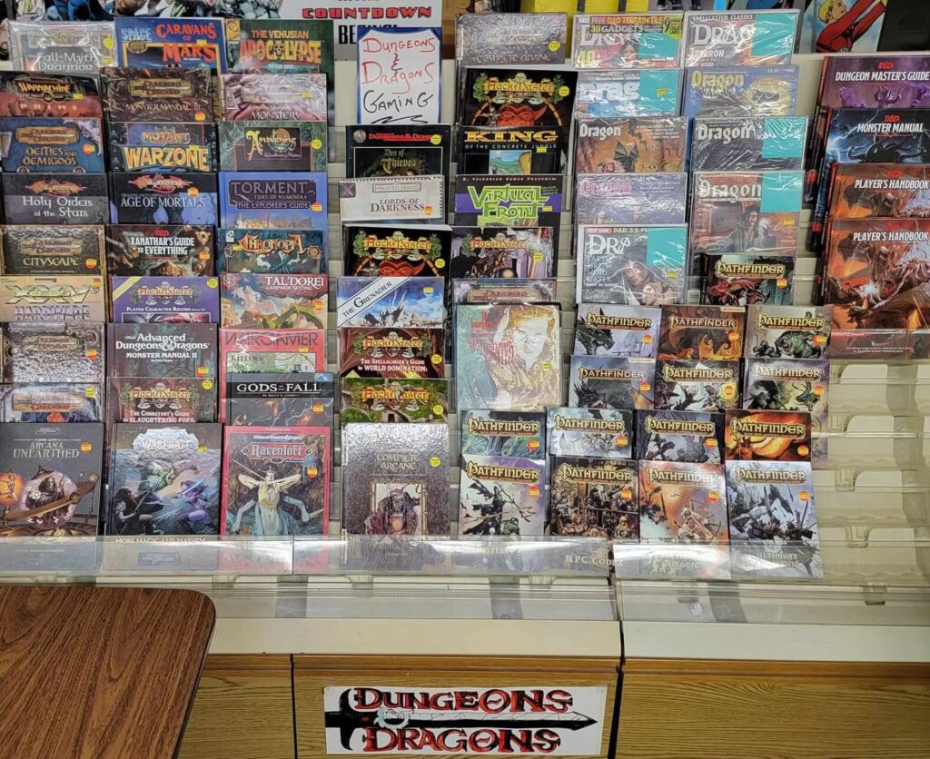 a rack of Dungeons and Dragons gaming books at Ravenswood Comics in New Hartford, NY